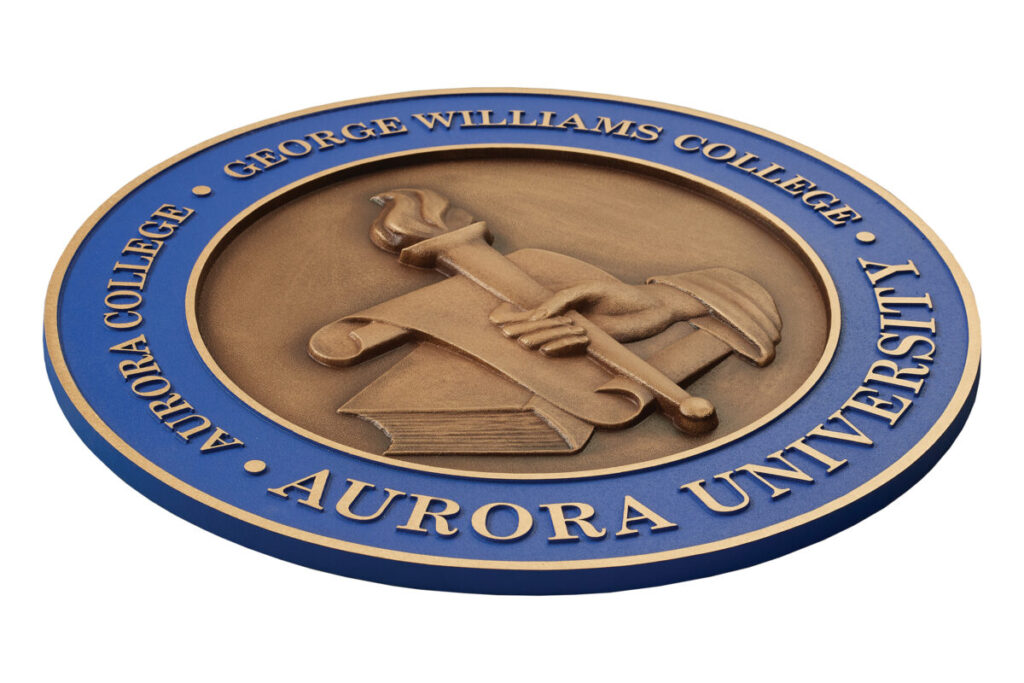 cast precision tooled aurora college metal plaque