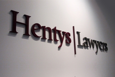 Hentys lawyers logo plastic letters NYC