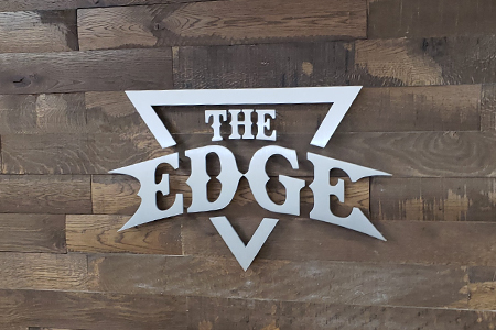 the edge metal letter logo sign