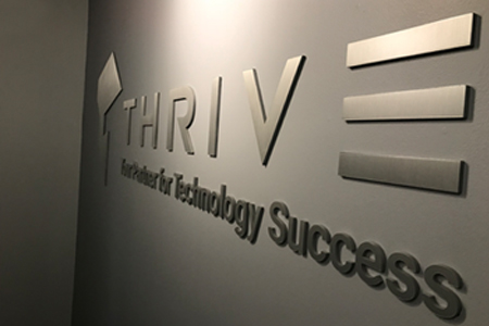 thrive technology office metal letter signage